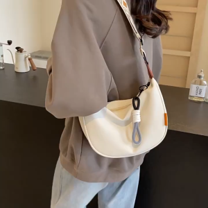 EchoBliss กระเป๋าผู้หญิงสไตล์ใหม่แฟชั่นบรรยากาศกระเป๋าเกี๊ยวแมทช์ง่ายสะพายไหล่สะพายข้างออกไปข้างนอก