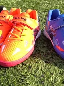 KELME เด็กรองเท้าฟุตบอลแท้ TF รองเท้าฟุตบอลเด็กรองเท้าการแข่งขันการฝึกอบรมระบายอากาศสาวกลางแจ้งรองเท้า ZX90113052