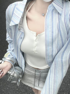 เสื้อเชิ้ตแขนยาวลายทางสีน้ำเงินสไตล์ฝรั่งเศสสำหรับผู้หญิงในช่วงต้นฤดูใบไม้ผลิและฤดูร้อนป้องกันแสงแดด เสื้อเชิ้ตผู้หญิงแบบหลวมๆ สไตล์เกาหลี