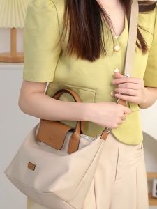 กระเป๋าทรงเกี๊ยวสำหรับผู้หญิง กระเป๋าสะพายข้างทรงแมสเซนเจอร์แบบเบาสบาย กระเป๋าผ้าแคนวาส