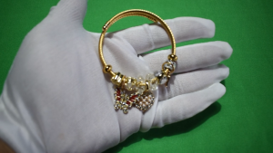 Lunara Gold Swan & Pearl Heart Charm Bracelet
