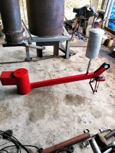 เตาจุดน้ำมันแบบพ่นไฟไปหน้า ใช้เผาถ่านแทนฟืน