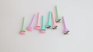 Hot Sale Mini Handheld Roller Massager Facial Eye Relaxation Skin Care Facial Roller For Puffiness Eye Bags Eye Muscle Ache