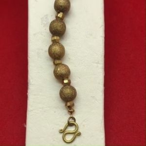 สร้อยข้อมืองานดิบทองเหลืองเม็ดจิกลายคั่นตุ้ม ความยาว 7 นิ้ว งานดิบไม่ได้ชุบ ทองเหลืองโบราณ ใส่ในชีวิตประจำวันได้ พร้อมส่ง