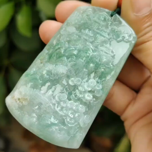 Crafted with Sceneries Pendant on Light Green Natural Type A Jadeite Jade certificate weighs 63.08 grams measurement 68.5 * 41.1 * 10.7 mm (pendant350)