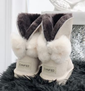 Winter 2025 New Womens Sheepskin Fur Integrated Snow Boots Medium Short Tube Anti-slip Warm Plush Butterfly Knot Turned Short Boots