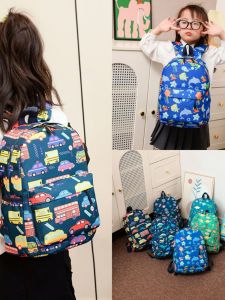 กระเป๋าเป้สะพายหลังลายรถบรรทุกสัตว์ป่าลายการ์ตูนน่ารักสำหรับเด็กอนุบาล กระเป๋าเป้สะพายหลังแบบสะพายไหล่คู่สำหรับเด็กชายและเด็กหญิง อุปกรณ์การศึกษา