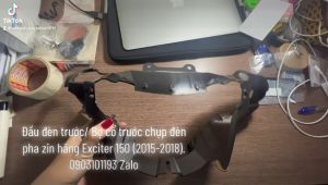 Đầu đèn trước/ Bợ cổ trước chụp đèn pha zin hãng Exciter 150 (2015-2018).