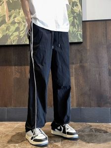 กางเกงลำลองชายฤดูร้อนแบบบาง กางเกงขายาวทรงตรงแห้งเร็ว กางเกงขายาวทรงตรงสำหรับเล่นกีฬา กางเกงขายาวลำลองสไตล์อเมริกัน
