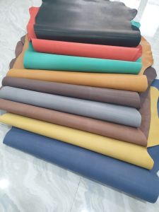 Da bò thuộc màu đỏ Da Thuộc San Nguyen - bán da bò vụn da phế liệu