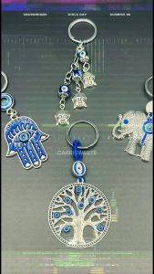 CARRISWERTE MINI LUCKY CHARM WITH EVIL EYE DESIGN KEYCHAIN SNAKE KEYCHAIN HAMSA ELEPHANT KEYCHAIN