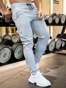 Mens Fitness Running Trousers Quick Dry Thin Casual Elastic Breathable Slimming Sports Long Pants Summer Supportive Brand