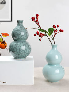 แจกันเซรามิกสีฟ้าลายน้ำเต้าน้ำเต้าของตกแต่งห้องนั่งเล่นใช้ในบ้านแบบสดใสสร้างสรรค์อุปกรณ์จัดดอกไม้ขนาดเล็กที่ใส่ดอกไม้ในน้ำเซรามิกหลง