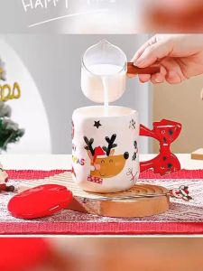 Ly sứ có nắp và quai nơ họa tiết ông già Noel Giáng sinh 2023 Cốc sứ Tuần lộc Snowman Merry Christmas 480ml kèm muỗng tuần lộc- Hộp Thường