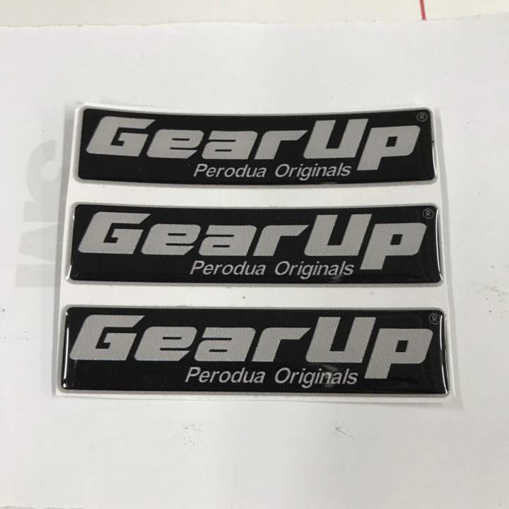 GEAR UP Logo Emblem Original Design Perodua Bezza Acia Myvi Ativa Alza Aruz Kancil Kelisa Kenali Kembara   Size: 7cm x 1.6cm  Ukuran: 70 x 16mm  Sticker 3M Original Design Perodua Emblem