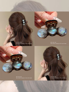 NING ZHOU | Elegant Small Hair Claw for Thin Hair with Blending Planets Design