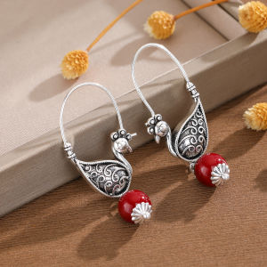 Retro Ethnic Womens Copper Earrings with Peacock-Shaped Pendants and Artificial Gem Beads Ideal for Parties and Dates.