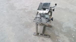 máy cán xơ mướp quay tay