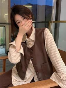 เสื้อกั๊กแขนกุดคอตั้งสไตล์ฮ่องกงย้อนยุคสำหรับผู้หญิง ฤดูใบไม้ร่วง 2025 ใหม่ แขนกุด คอตั้ง ทรงสลิมฟิต เสื้อคลุมกันหนาว