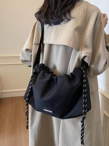 Casual Nylon Dumpling Shaped Shoulder Bag with Rope Knot for Commuting Versatile Leisure Crossbody Bag Simple Japanese Style