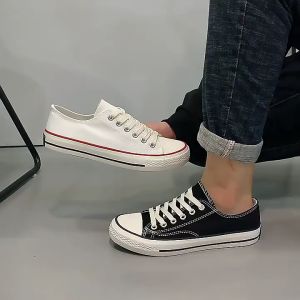 รองเท้าผ้าใบทรงเตี้ยใหม่สำหรับผู้ชายและผู้หญิงรองเท้านักเรียนแฟชั่นเกาหลีสีดำและสีขาวคลาสสิกที่ดีที่สุด