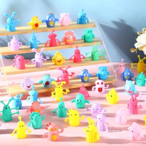 XT Mini Finger Puppets Toys 10pcs Cute Monster Stretchy Finger Puppets Soft Rubber Fidget Doll Toys for Role Playing Party Christmas