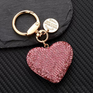 The shiny rhinestone heart-shaped keychain is the perfect Valentines Day gift for ladies including key bags and earphone cases