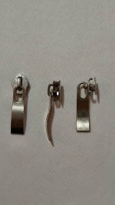 Kepala Resleting Coil No.5 (Normal) Isi 100 Pcs Jenis Lengkung