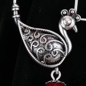 Retro Ethnic Womens Copper Earrings with Peacock-Shaped Pendants and Artificial Gem Beads Ideal for Parties and Dates.