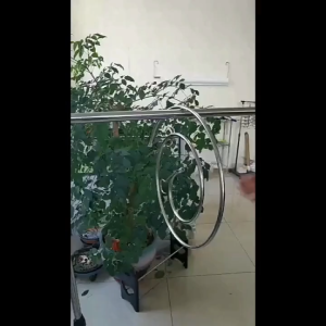 A Stainless Steel Spiral Clothes Hanger For Drying Quilts And Bed Sheets A Rotating Multi-functional Rack With Hooks For Laundry Poles.