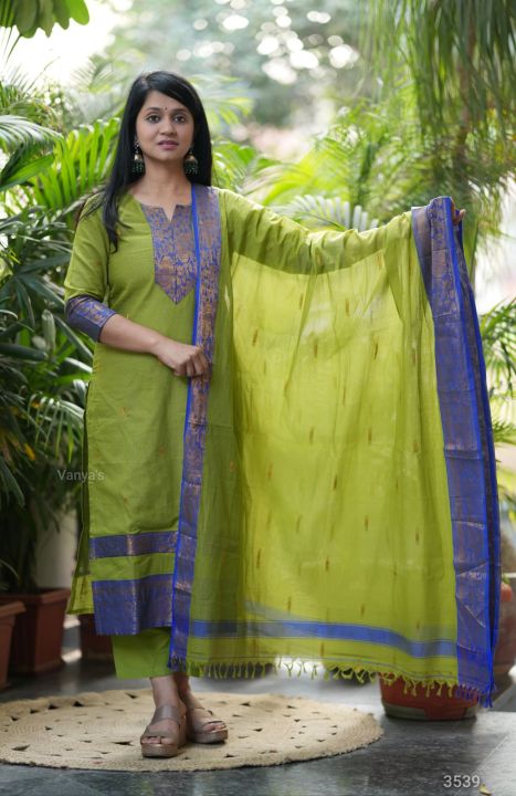 kanchi cotton dress NEELAM  A pure kanchi cotton dress with dupion silk yoke!Embrace the  timeless elegance of this cotton dress with a striking blue border! Perfect  for any occasion, its breathable fabric ensures comfort,
