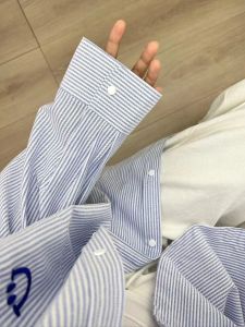 เสื้อเชิ้ตคอโปโลลายทางคอตตอนแท้สำหรับผู้หญิง ทรงหลวม แขนยาว ทรงเข้ารูป เสื้อเชิ้ตแฟชั่นฤดูใบไม้ร่วง 2024