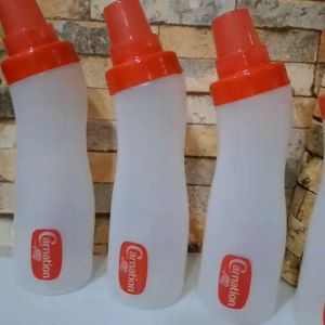 ขวดบีบคาร์เนชั่น (1 ขวด) ขวดใส่นมข้นหวาน ใส่ซอส ใส่น้ำหวาน ใส่อาหารทั่วไป มี ฝาปิด