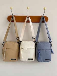 2024 New Womens Mini Canvas Crossbody Bag Vertical Mobile Phone Bag Pure Color Versatile Cute Coin Purse Casual Simple Style