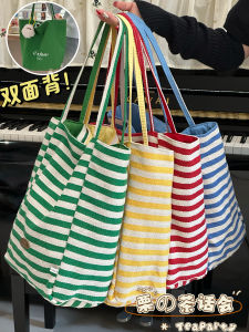 กระเป๋าผ้าใบลายทางความจุขนาดใหญ่ กระเป๋าถือสะพายไหล่ข้างเดียวสำหรับการเดินทางและใช้ชีวิตประจำวัน กระเป๋าผ้าใบลายทาง กระเป๋าสะพายไหล่ กระเป๋าถือ กระเป๋าเดินทาง กระเป๋าถือสำหรับผู้หญิง