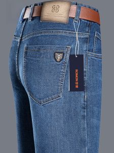 ROMON | กางเกงยีนส์ทรงตรงลำลองสำหรับผู้ชาย ทรงหลวม ทรงธุรกิจ ฤดูใบไม้ร่วง/ฤดูหนาว กางเกงขายาว ทรงหลวม ทรงลำลอง ผ้าเดนิม ทรงหลวม ทรงลำลอง