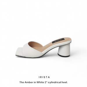 The Amber Sandal in Black Satin Minimalist heels with a soft footbed and 2-inch cylindrical heel.