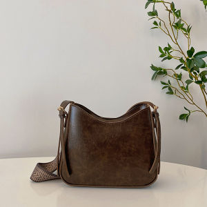 Retro Versatile Single Shoulder Womens Bag Pure Color Crossbody Bag Wide Strap Fashionable Bucket Bag Soft PU Leather
