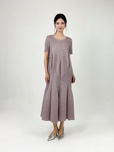 Đầm chất Miyake kẻ sọc dáng quả bí cách điệu thanh lịch  - 55kg.Linh