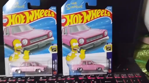 The Simpsons Hot Wheels 2 Piece Set Pink Car with Homer Simpson Figure 1/64 Scale Collectible