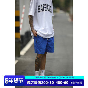 กางเกงขาสั้นวิ่งแห้งเร็วสำหรับผู้ชาย กางเกงขาสั้นลำลองฤดูร้อน กางเกงขายาวทรงหลวมสบาย ๆ สีฟ้า กางเกงขายาวชายหาด สไตล์อเมริกัน