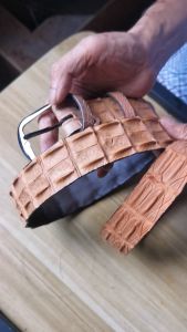 Popular belts are crocodile leather double bone buckle pin buckle