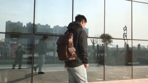 SLGOL แฟชั่น วินเทจผู้ชาย กระเป๋าเป้สะพายหลัง PU หนังกระเป๋าเดินทางแล็ปท็อป 15 นิ้ว คอมพิวเตอร์ Macbook