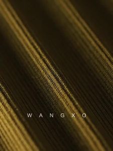 WANGXO | Knitted Dress with Hollow Segments and Waist Cinching Ice Flax Fabric