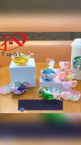 TWOL SHOP 1pcs Creative Glitter into Oil Floating Jelly Bean Keychain Acrylic Whale Liquid Keychain Car Key Pendant Schoolbag Pendant Holiday Small Gifts