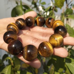 สร้อยข้อมือลูกประคำ หินควอตซ์ ไทเกอร์อาย สีดำเหลือง ลายธรรมชาติ 18 MM 12 เม็ด ความยาว 8.5 นิ้ว ยืดหยุ่นได้เล็กน้อย