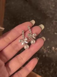 ต่างหูไข่มุกเงินแท้ S925 สำหรับผู้หญิง ดีไซน์ใหม่ปี 2025 ต่างหูรูปหมั้นจี้ไข่มุกสไตล์เกาหลี ดีไซน์เก๋ไก๋ เครื่องประดับระดับไฮเอนด์