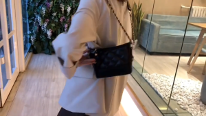 Black quilted crossbody shoulder bag