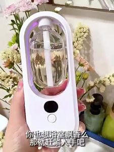 Automatic Aroma Diffuser Air FreshenerEssential Oil DiffuserAromatherapy Humidifiers for Kitchen & Toilet Deodorizer家居香薰机香水加湿器