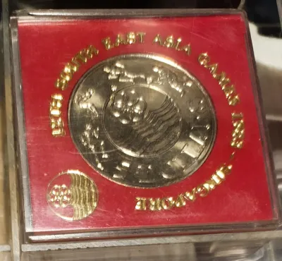 Singapore Mint $5 commemorative uncirculated coins